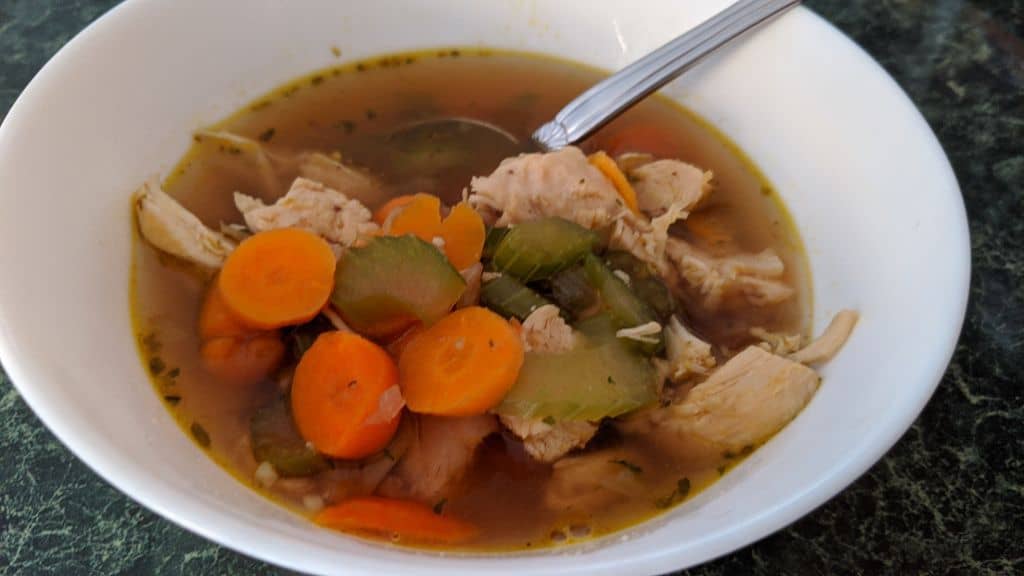 photo of a bowl of chicken soup